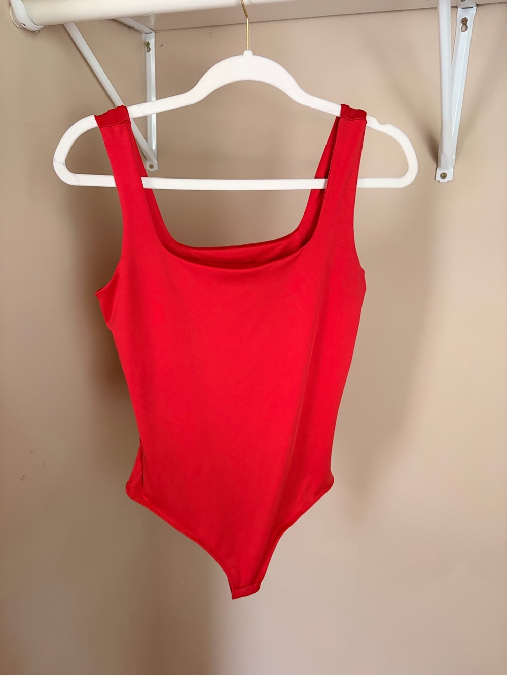 Women’s Red One-Piece Body Suit